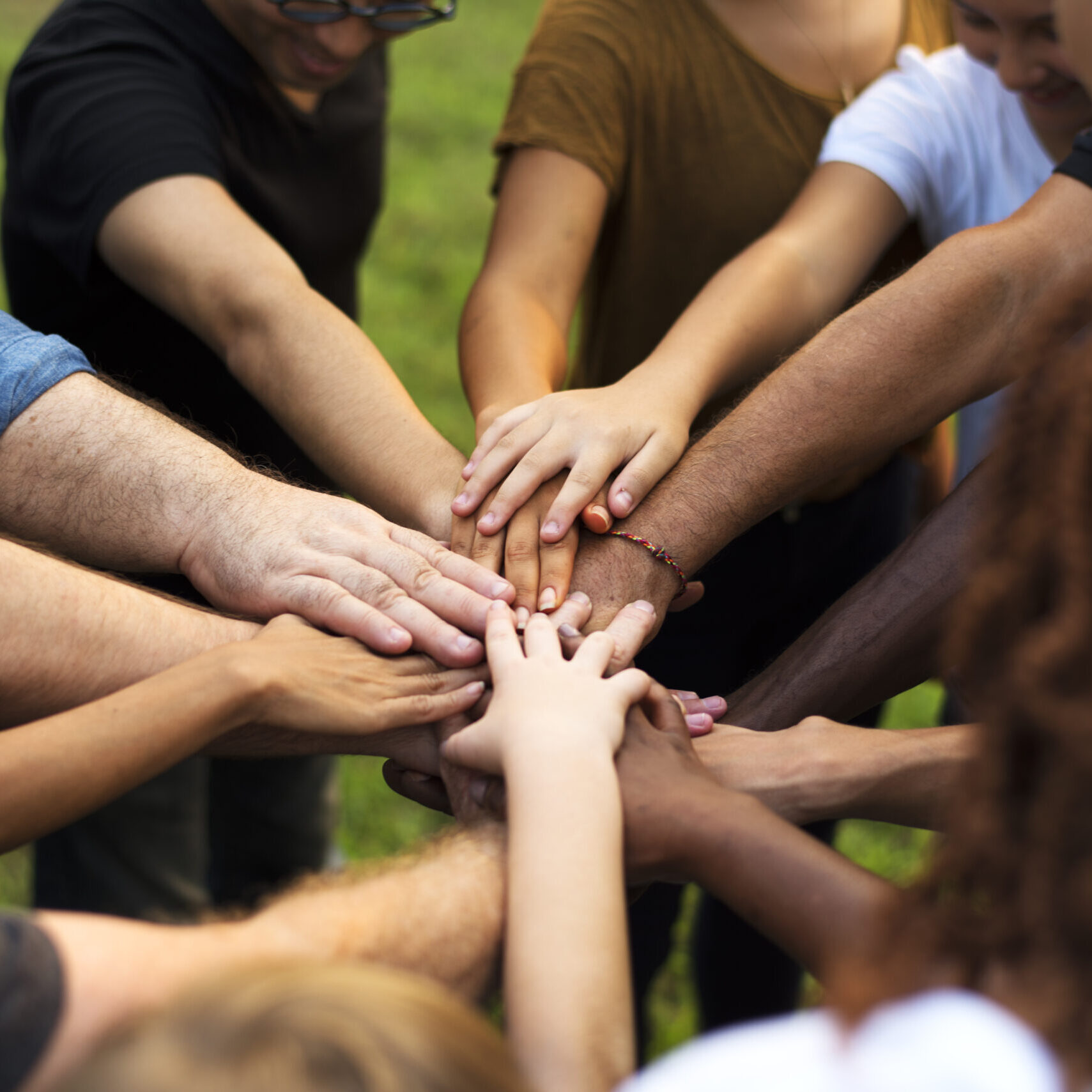 Group of diversity people hands stack support together